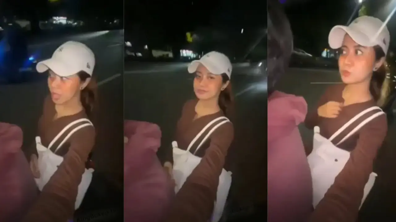 lagi naik  motor malah pamer Tt